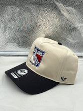 Load image into Gallery viewer, a white and black hat sitting on top of a white table