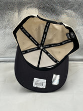 Load image into Gallery viewer, a black and white hat sitting on top of a counter