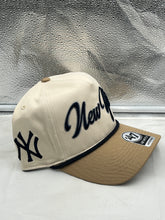 Load image into Gallery viewer, a new york yankees hat sitting on top of a counter