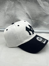 Load image into Gallery viewer, a new york yankees hat sitting on top of a counter