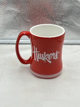 Load image into Gallery viewer, a red coffee mug with the word thunders written on it