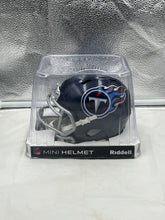 Load image into Gallery viewer, Tennessee Titans NFL Riddell Blue Speed Replica Mini Helmet side view highlighting its detailed design and official NFL branding.