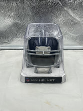 Load image into Gallery viewer, Tennessee Titans NFL Riddell Blue Speed Replica Mini Helmet placed on a desk, perfect for Titans fans and sports memorabilia collectors.