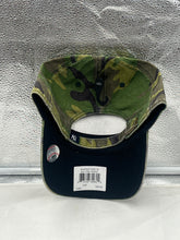 Load image into Gallery viewer, a green and black hat with a bar code on it