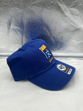 Load image into Gallery viewer, a blue hat sitting on top of a white counter