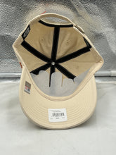 Load image into Gallery viewer, Texas Longhorns NCAA '47 Brand Natural Clean Up Adjustable Strapback Hat displayed on a wooden surface, showcasing its stylish design and iconic logo, perfect for fans supporting their team.