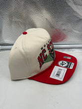 Load image into Gallery viewer, Model wearing the NC State Wolfpack NCAA '47 Brand Natural TT Rope Hitch Adjustable Snapback Hat in a casual setting.