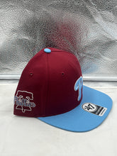 Load image into Gallery viewer, Philadelphia Phillies MLB '47 Brand Red Two Tone Captain Adjustable Snapback Hat worn by a fan, representing team spirit at a game.
