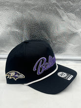 Load image into Gallery viewer, Baltimore Ravens NFL '47 Brand hat displayed with a sleek black fabric, making it a versatile accessory for both men and women.