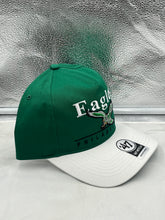 Load image into Gallery viewer, Philadelphia Eagles NFL '47 Throwback Green TT Hitch Snapback Adjustable Hat laid flat with a blurred stadium background, perfect for showing off fan gear.