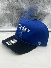 Load image into Gallery viewer, Close-up view of the Indianapolis Colts NFL '47 Throwback Blue Two Tone Hitch Snapback Adjustable Hat featuring the embroidered team logo, ideal for displaying team spirit.