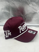 Load image into Gallery viewer, Close-up view of Texas A&M Aggies NCAA '47 Brand Maroon Script Hitch Rope Adjustable Snapback Hat, highlighting the script logo and hitch rope detail.