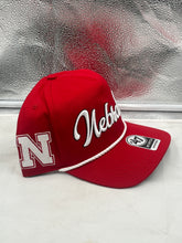 Load image into Gallery viewer, Close-up view of the Nebraska Cornhuskers NCAA '47 Brand Red Script Hitch Adjustable Snapback Hat, highlighting the adjustable snapback closure and premium quality materials.
