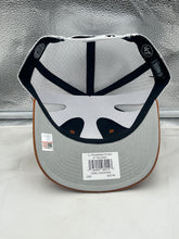 Load image into Gallery viewer, Texas Longhorns NCAA '47 Brand Orange Trucker Adjustable Snapback Mesh Hat worn by a fan at a game, illustrating team spirit and comfort in a casual setting.