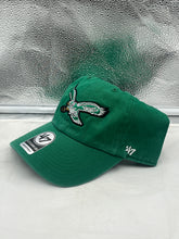 Load image into Gallery viewer, a green hat sitting on top of a window sill