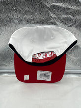 Load image into Gallery viewer, Model wearing the Indiana Fever WNBA '47 Brand White Two Tone Hitch Adjustable Snapback Hat outdoors, demonstrating a trendy look.