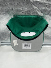 Load image into Gallery viewer, Lifestyle shot of a fan wearing the Minnesota North Stars NHL '47 Throwback Green Hitch Rope Adjustable Snapback Hat, perfect for game days or casual outings.