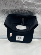 Load image into Gallery viewer, Side view of the Florida State Seminoles FSU NCAA '47 Brand Black Clean Up Adjustable Hat worn by a fan at a sports game.