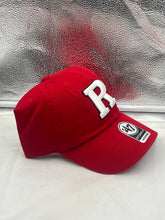 Load image into Gallery viewer, Rutgers Scarlet Knights NCAA &#39;47 Brand Red Clean Up Adjustable Strapback Hat worn by a model at a tailgate event, demonstrating comfort and school pride.
