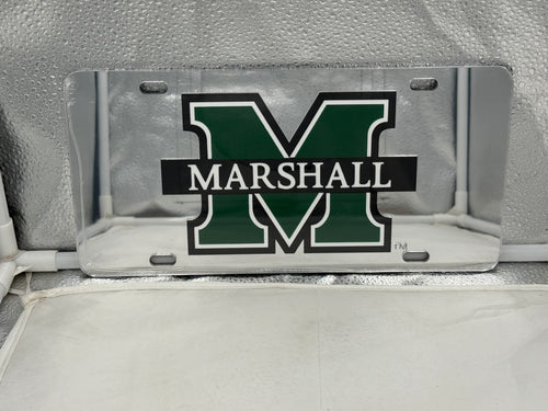 Marshall Thundering Herd NCAA Silver Mirrored Laser Cut License Plate Craftique, showcasing a stunning silver mirrored finish and intricate laser-cut logo, perfect for any fan's vehicle or home décor.
