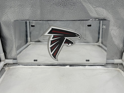 Atlanta Falcons NFL Silver Reflective Lasercut License Plate by WinCraft showcasing intricate team logo and durable construction, designed to display pride for Atlanta Falcons fans on vehicles.