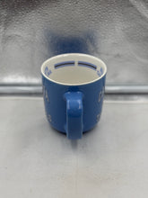 Load image into Gallery viewer, North Carolina Tar Heels Mug with team logo, microwave and dishwasher safe, ideal for showcasing team spirit at home or office.
