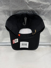 Load image into Gallery viewer, USC Trojans NCAA '47 Brand Black Clean Up Adjustable Strapback Hat worn by a fan at a game, representing team spirit and style.
