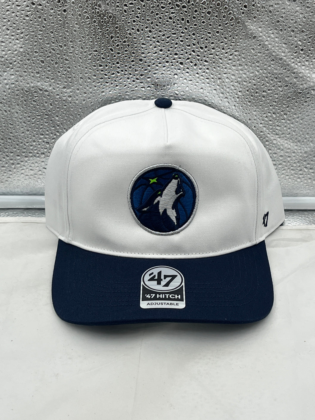 Minnesota Timberwolves NBA '47 Brand White Two Tone Hitch Adjustable Snapback Hat showcased on a flat surface.