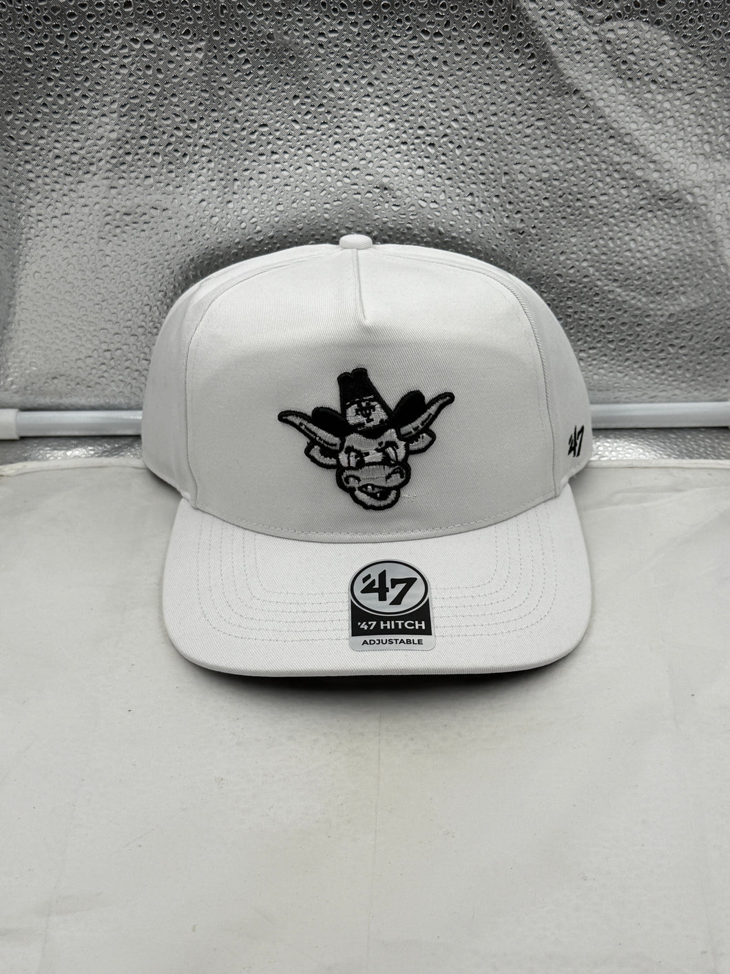 Texas Longhorns NCAA '47 Brand Throwback White Hitch Adjustable Snapback Hat showcasing the iconic team logo.