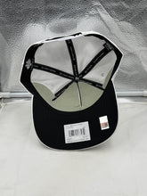 Load image into Gallery viewer, Stylish Texas Longhorns hat perfect for gameday, shown against a vibrant outdoor background.
