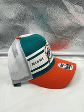 Load image into Gallery viewer, Miami Dolphins NFL &#39;47 Throwback Teal TT Hitch Mesh Snapback Adjustable Hat worn by a fan at a tailgate party displaying team spirit.
