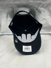 Load image into Gallery viewer, Lifestyle image of a fan wearing the Vanderbilt Commodores NCAA &#39;47 Brand Black Clean Up Adjustable Strapback Hat at a tailgate, representing team spirit.
