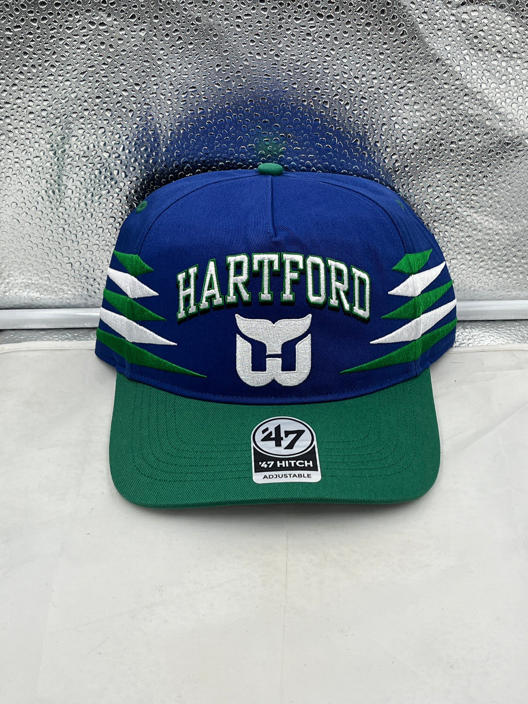 Hartford Whalers NHL '47 Brand Blue Diamond Hitch Adjustable Snapback Hat showcasing a stylish blue design perfect for fans.