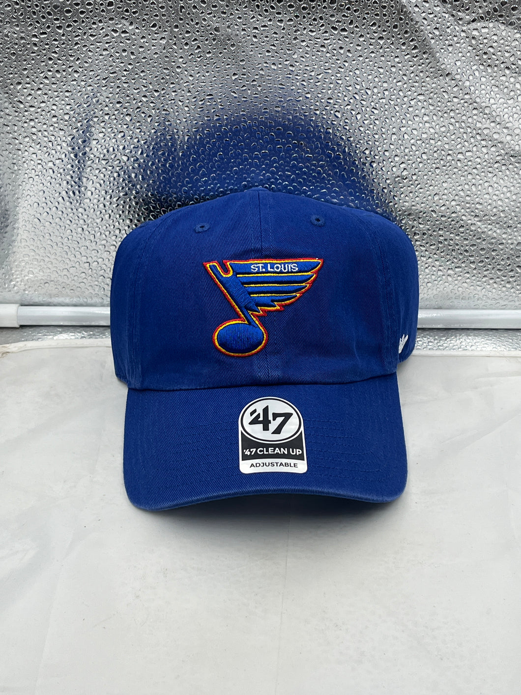 St Louis Blues NHL '47 Brand Throwback Blue Clean Up Adjustable Strapback Hat showcasing the team's logo and stylish design for avid hockey fans.