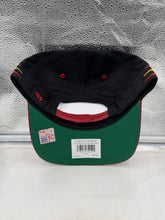 Load image into Gallery viewer, Model wearing USC Trojans NCAA '47 Brand Black Diamond Hitch Snapback Adjustable Hat during a casual outing, perfect for showing team spirit.
