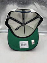 Load image into Gallery viewer, Flat lay of UConn Huskies NCAA '47 Brand Champs Off White TT Hitch Adjustable Snapback Hat on a wooden table - must-have UConn Huskies hat.
