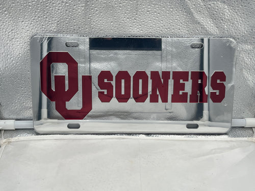 Oklahoma Sooners NCAA Silver Mirrored Laser Cut License Plate by Craftique showcasing intricate design and team logo.