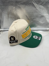 Load image into Gallery viewer, Model wearing the Minnesota North Stars NHL &#39;47 Throwback Natural TT Hitch Adjustable Snapback Hat, demonstrating team spirit and style, a perfect accessory for supporters of the Minnesota North Stars hat.
