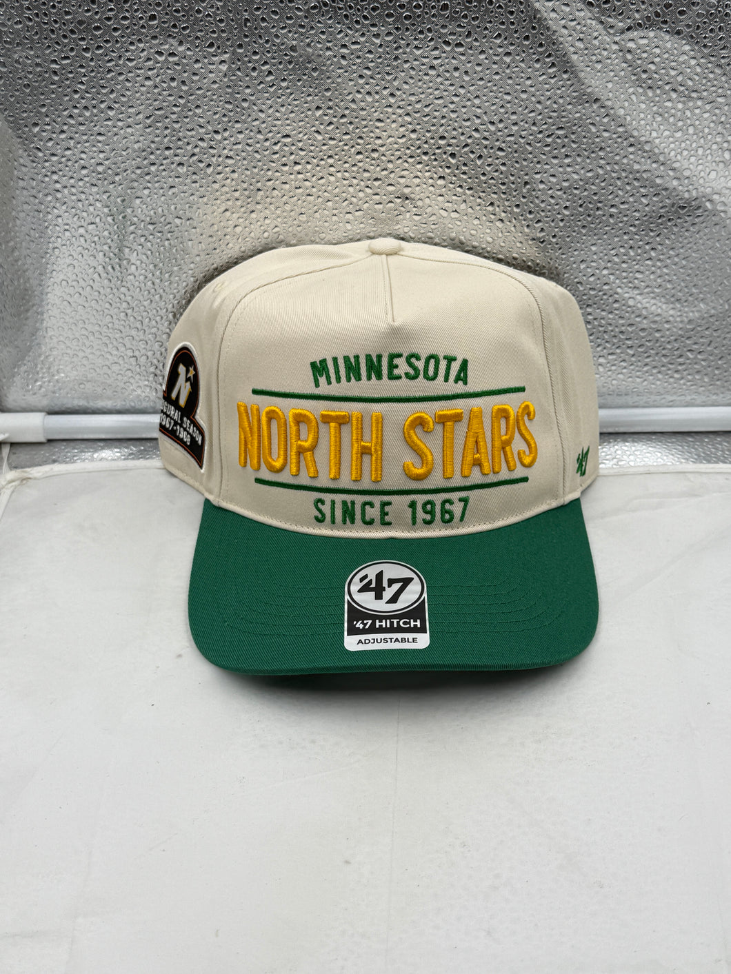Minnesota North Stars NHL '47 Throwback Natural TT Hitch Adjustable Snapback Hat showcasing the iconic team logo, perfect for fans of the Minnesota North Stars hat.