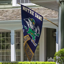 Load image into Gallery viewer, Display of the Notre Dame Fighting Irish NCAA 28&quot; x 40&quot; One Sided Banner by WinCraft, showcasing durable construction and vivid graphics for indoor and outdoor use.
