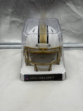 Load image into Gallery viewer, New Orleans Saints NFL Riddell Speed On-Field Alternate White Mini Helmet displayed on a stand, perfect for display in a sports memorabilia collection, representing the New Orleans Saints Mini Helmet.
