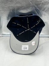 Load image into Gallery viewer, Lifestyle image of the Seattle Mariners MLB &#39;47 Brand Navy Blue Hitch Adjustable Snapback Hat worn by a fan, perfect for casual outings or game days.
