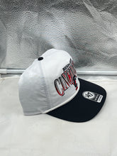 Load image into Gallery viewer, Lifestyle shot of a fan wearing the Cincinnati Bearcats NCAA &#39;47 Brand White Two Tone Hitch Adjustable Snapback Hat at a game.
