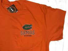 Load image into Gallery viewer, Lifestyle image of a person wearing the Florida Gators NCAA Image One Orange Men's Tee Shirt at a game, representing team spirit and style, Florida Gators Shirt.

