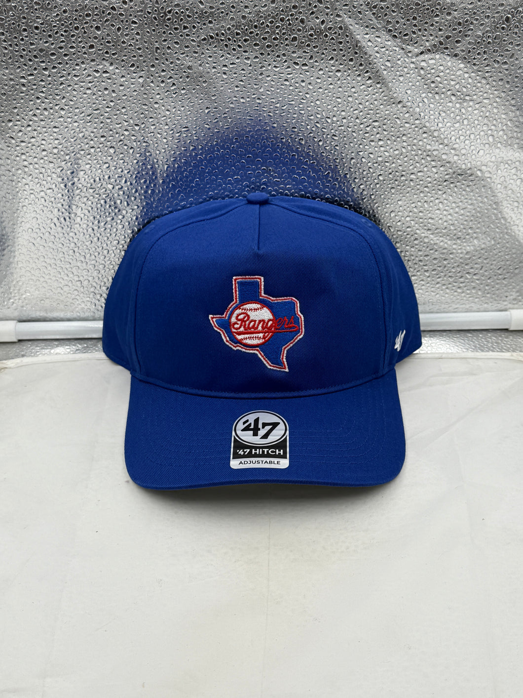 Texas Rangers MLB '47 Brand Throwback Blue Hitch Adjustable Snapback Hat, a vintage-style Texas Rangers hat featuring a blue design and adjustable fit.