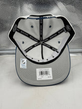 Load image into Gallery viewer, Lifestyle image of a person wearing the Colorado Avalanche NHL '47 Brand White Diamond Hitch Adjustable Snapback Hat at an outdoor event, demonstrating team spirit.
