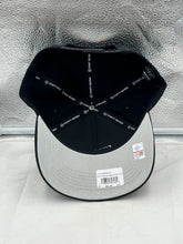 Load image into Gallery viewer, South Carolina Gamecocks NCAA &#39;47 Brand Black Hitch Adjustable Snapback Hat arranged with other Gamecocks merchandise, perfect for showcasing team spirit.
