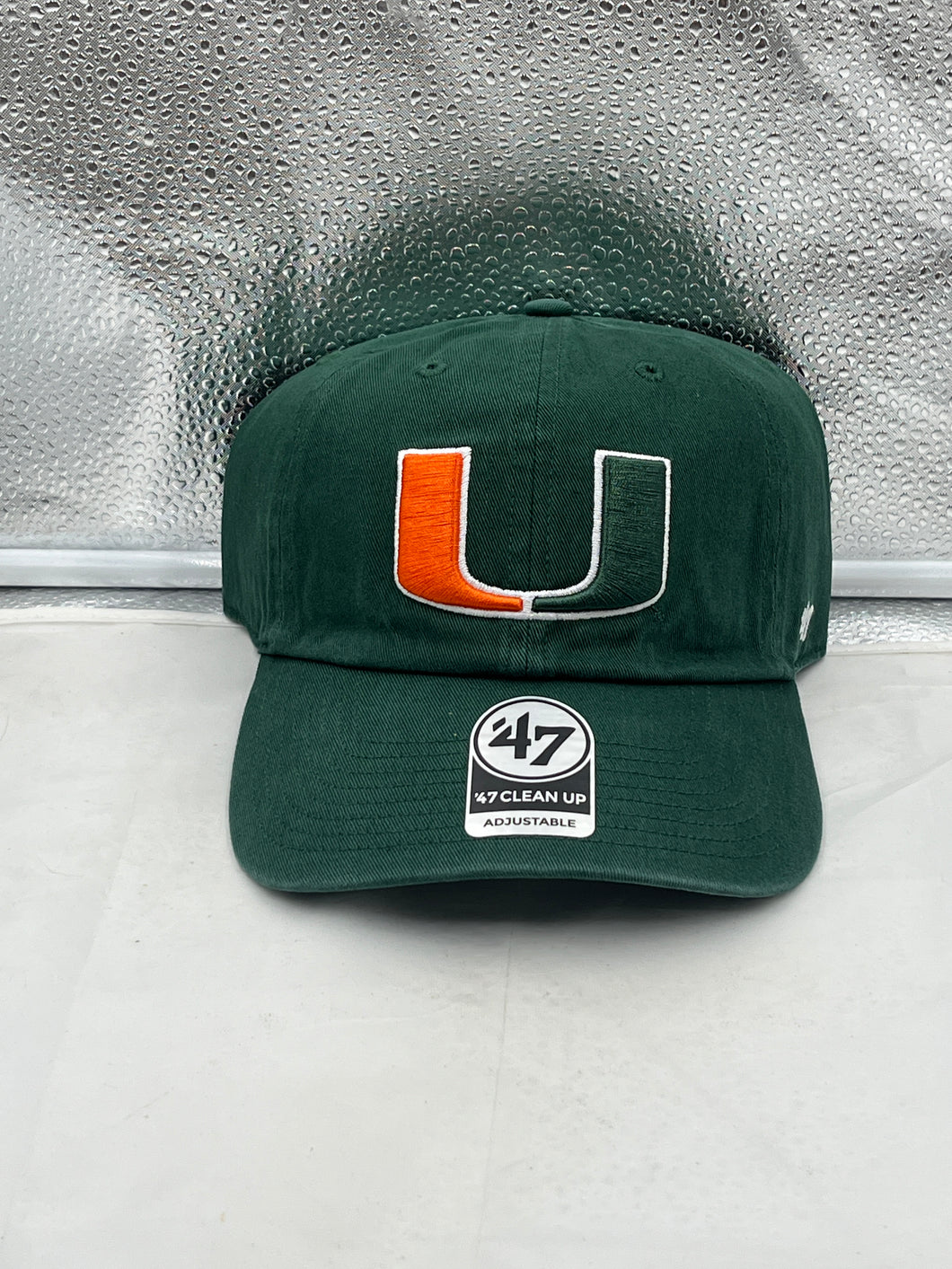 Miami Hurricanes NCAA '47 Brand Green Clean Up Adjustable Hat showcasing the iconic logo and vibrant green color, perfect for sports fans and casual outings.