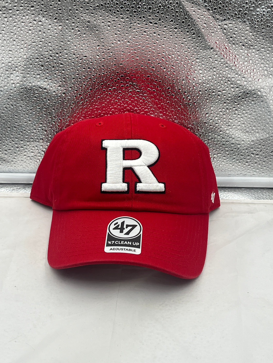 Rutgers Scarlet Knights NCAA '47 Brand Red Clean Up Adjustable Strapback Hat showcasing the iconic logo, perfect for fans to wear at games and casual outings.