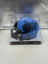 Load image into Gallery viewer, Close-up view of the Tennessee Titans NFL Riddell Speed Alternate Blue Mini Helmet, showcasing detailed design and vibrant blue color ideal for display.
